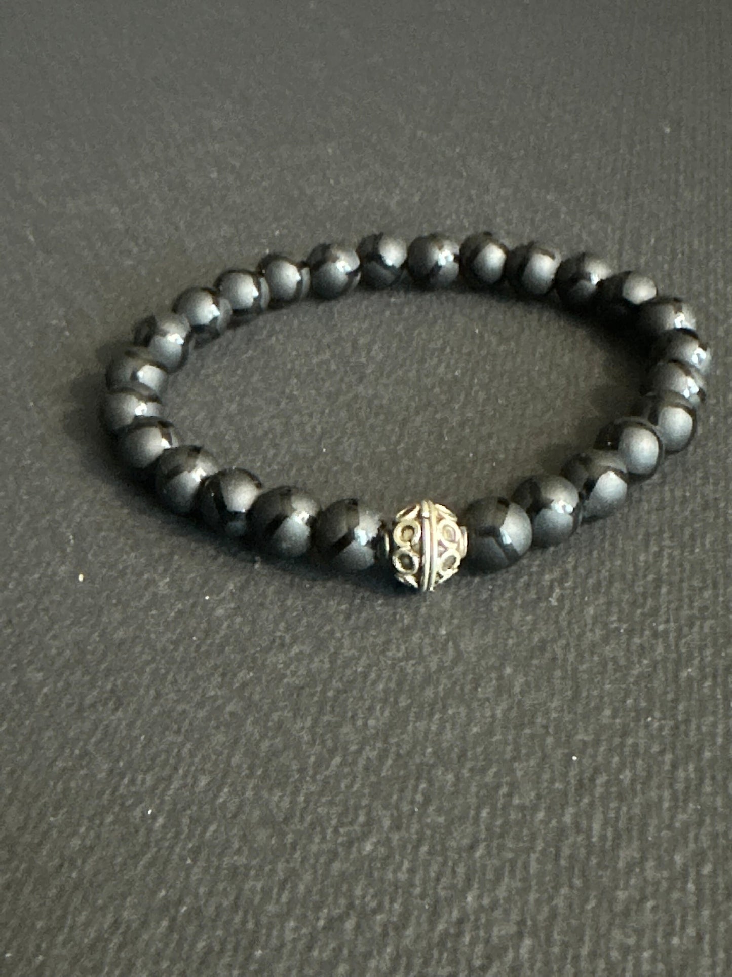 Striped Matte Onyx Bracelet with and Silver Focal Bead