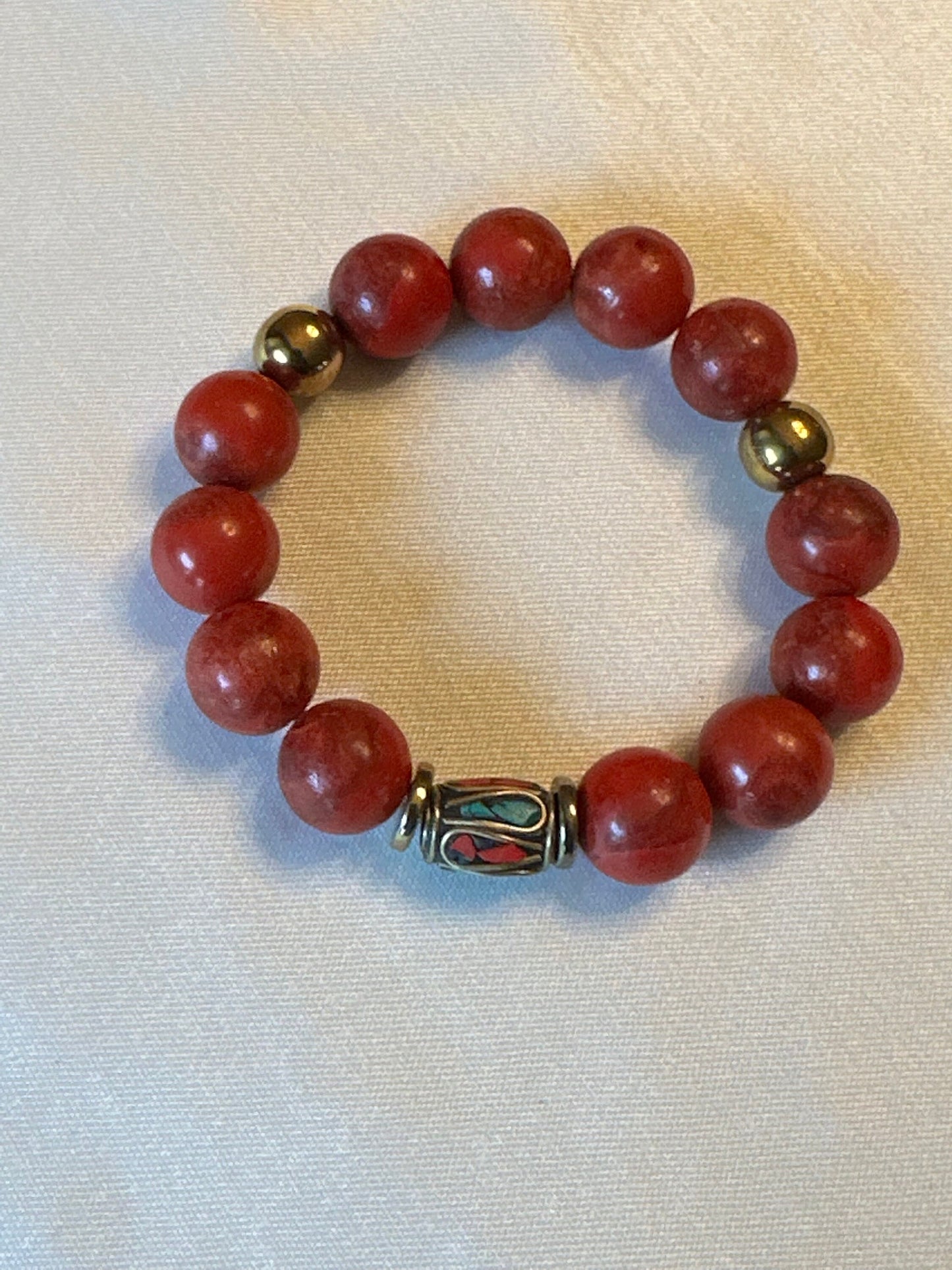 Red Ceramic Beaded Bracelet with Inlaid Nepali Brass Beads and Hematite Spacer Beads