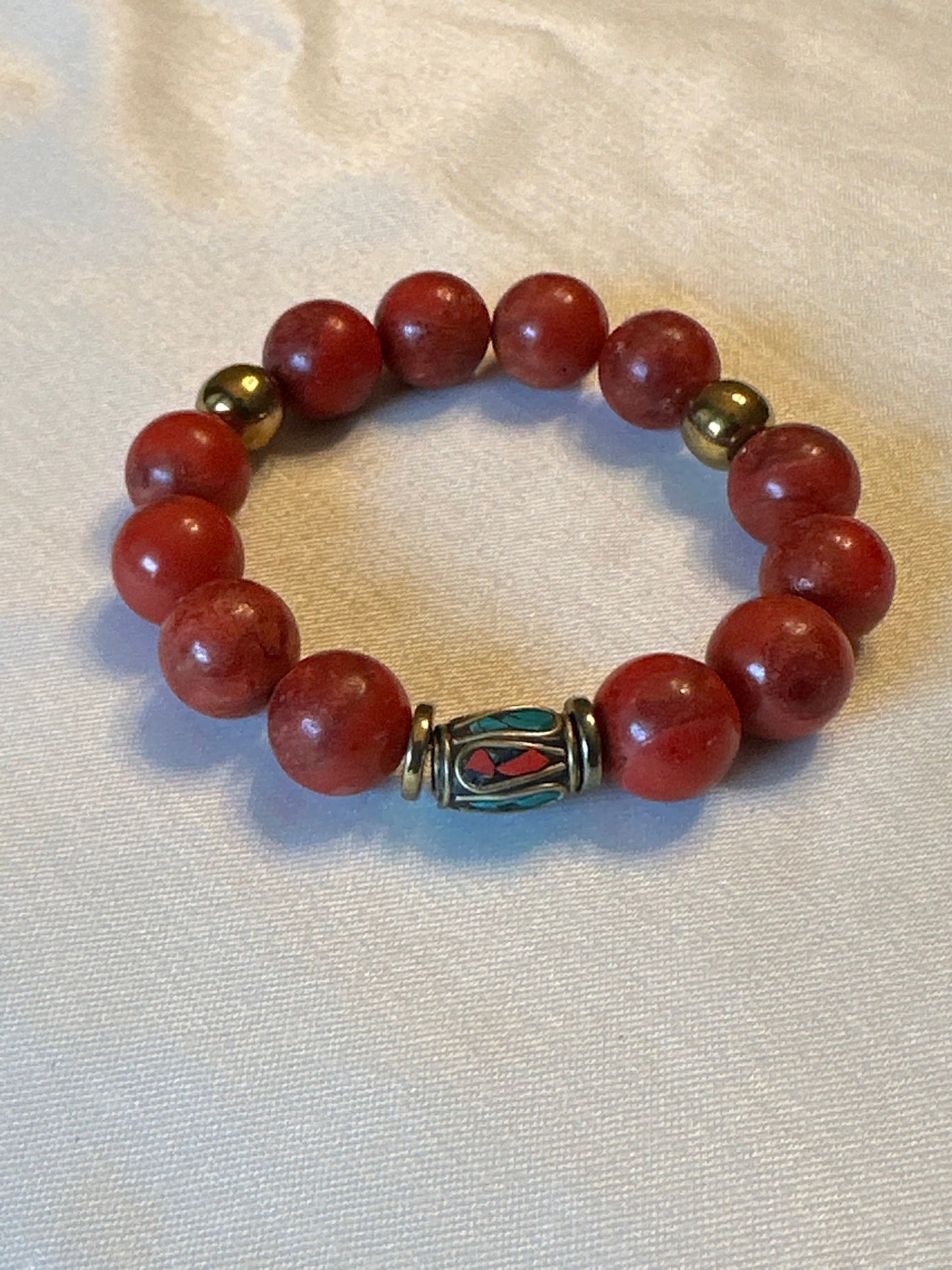 Red Ceramic Beaded Bracelet with Inlaid Nepali Brass Beads and Hematite Spacer Beads