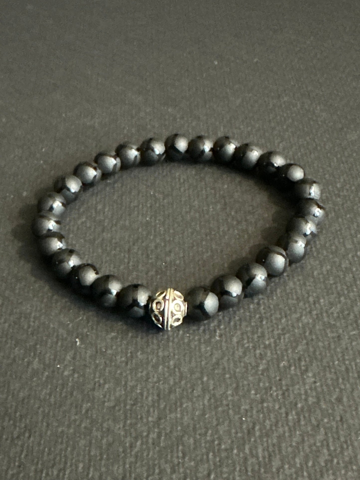 Striped Matte Onyx Bracelet with and Silver Focal Bead