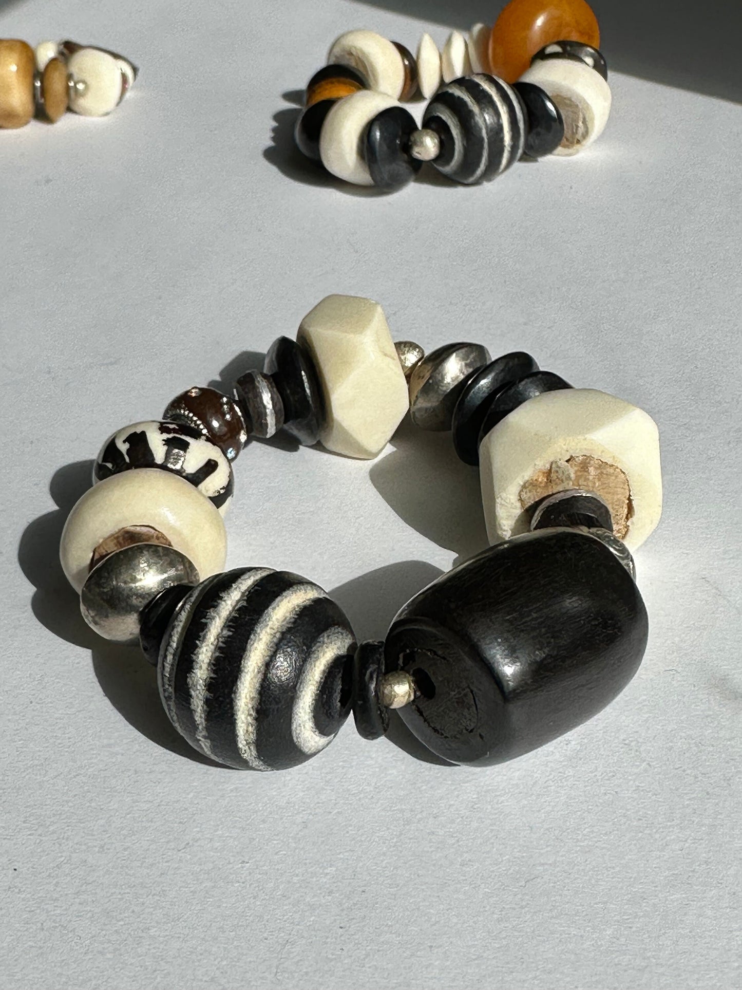Large Batik Barrel Bone Focal Beaded Bracelet with Wood Saucer Round Faceted and Sauce White Bone Beaded Bracelet