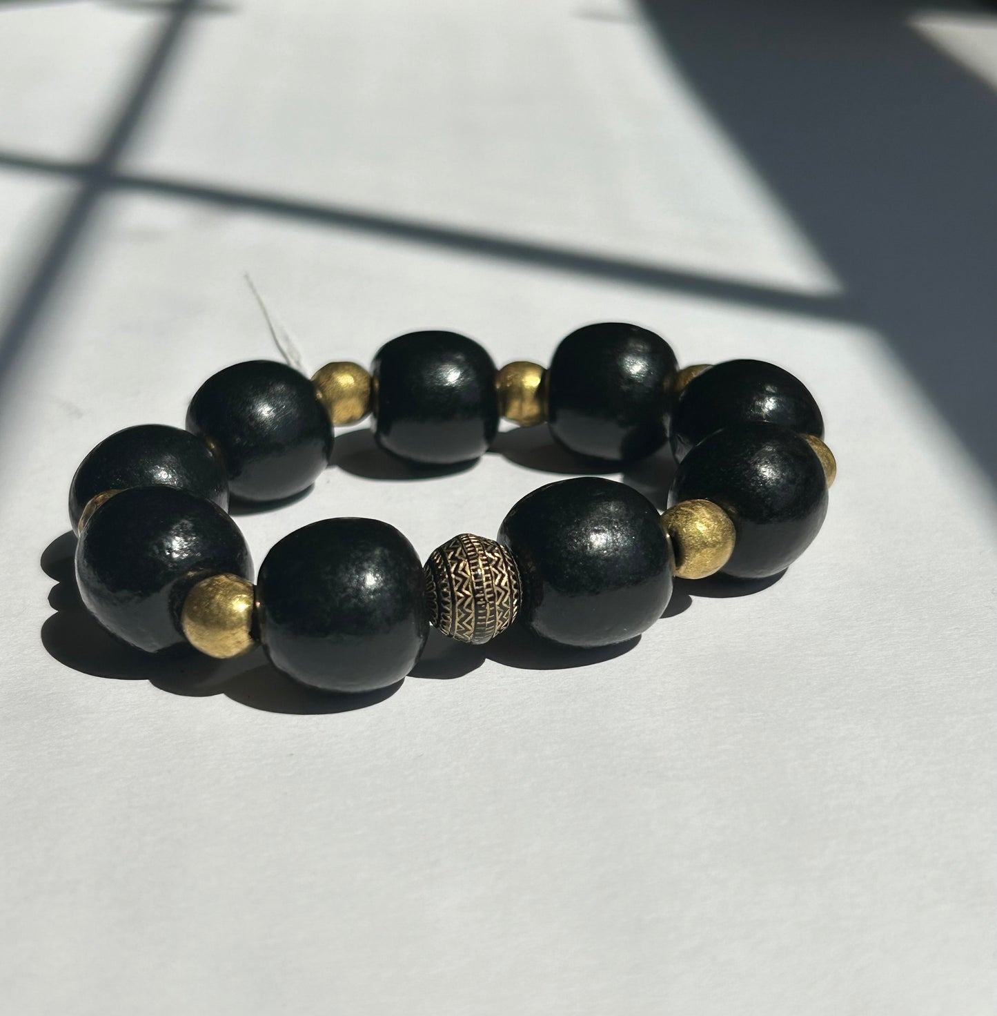 Black Wood Beaded Bracelet with Gold Accents