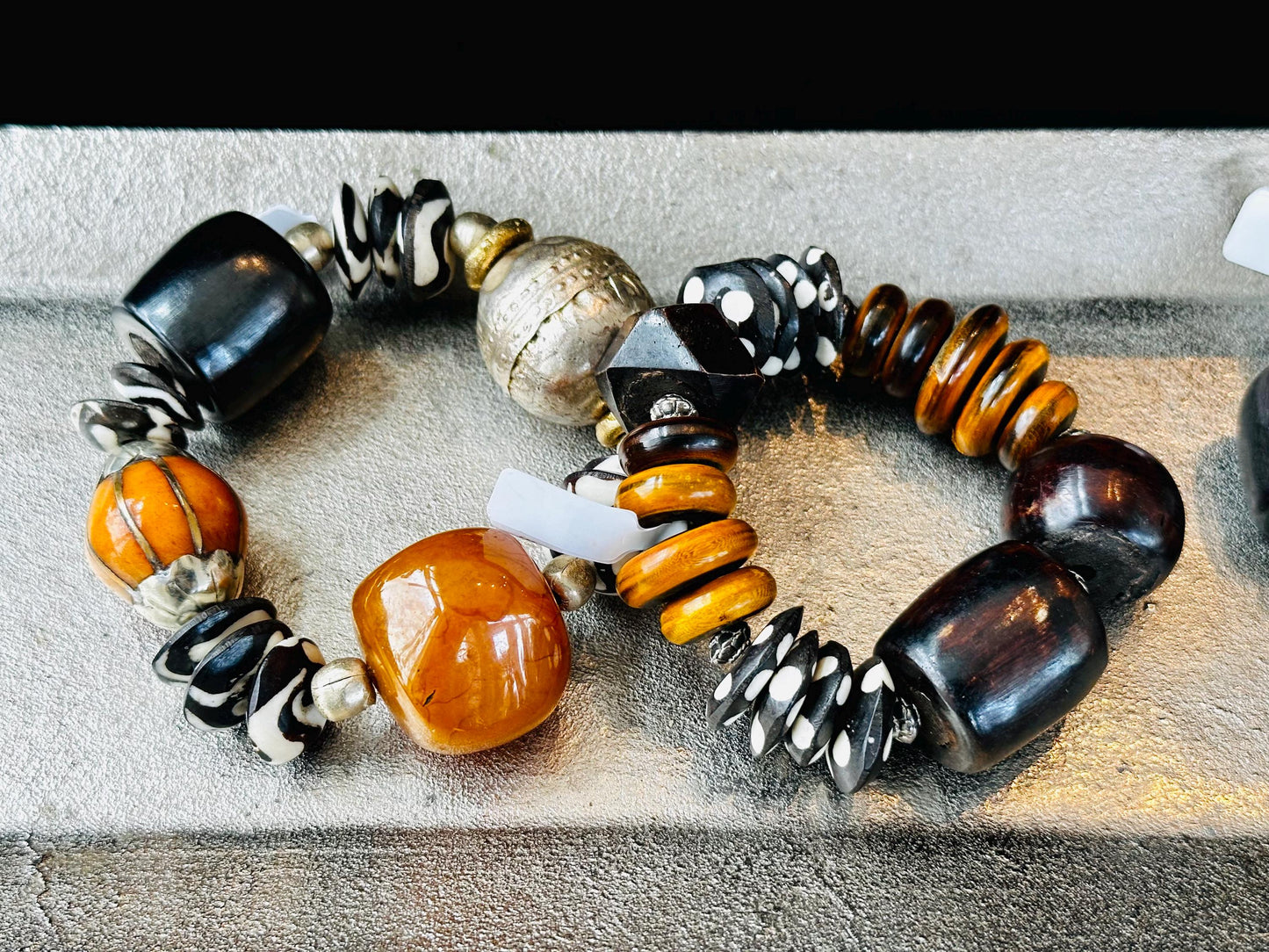 BohoChic Unisex Bracelet Handcrafted with Multi Shaped Bone and Horn Disc Beads.
