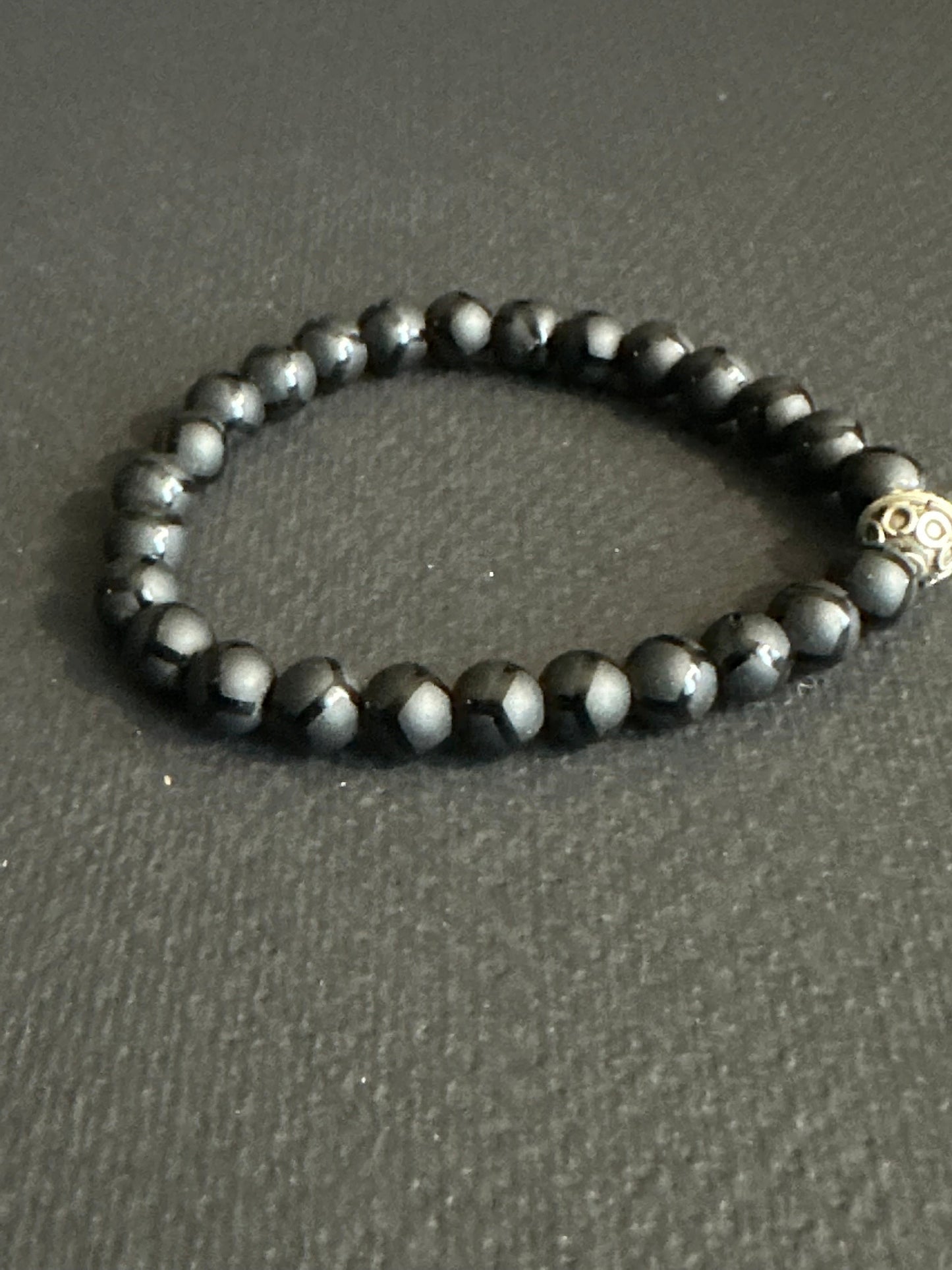 Striped Matte Onyx Bracelet with and Silver Focal Bead