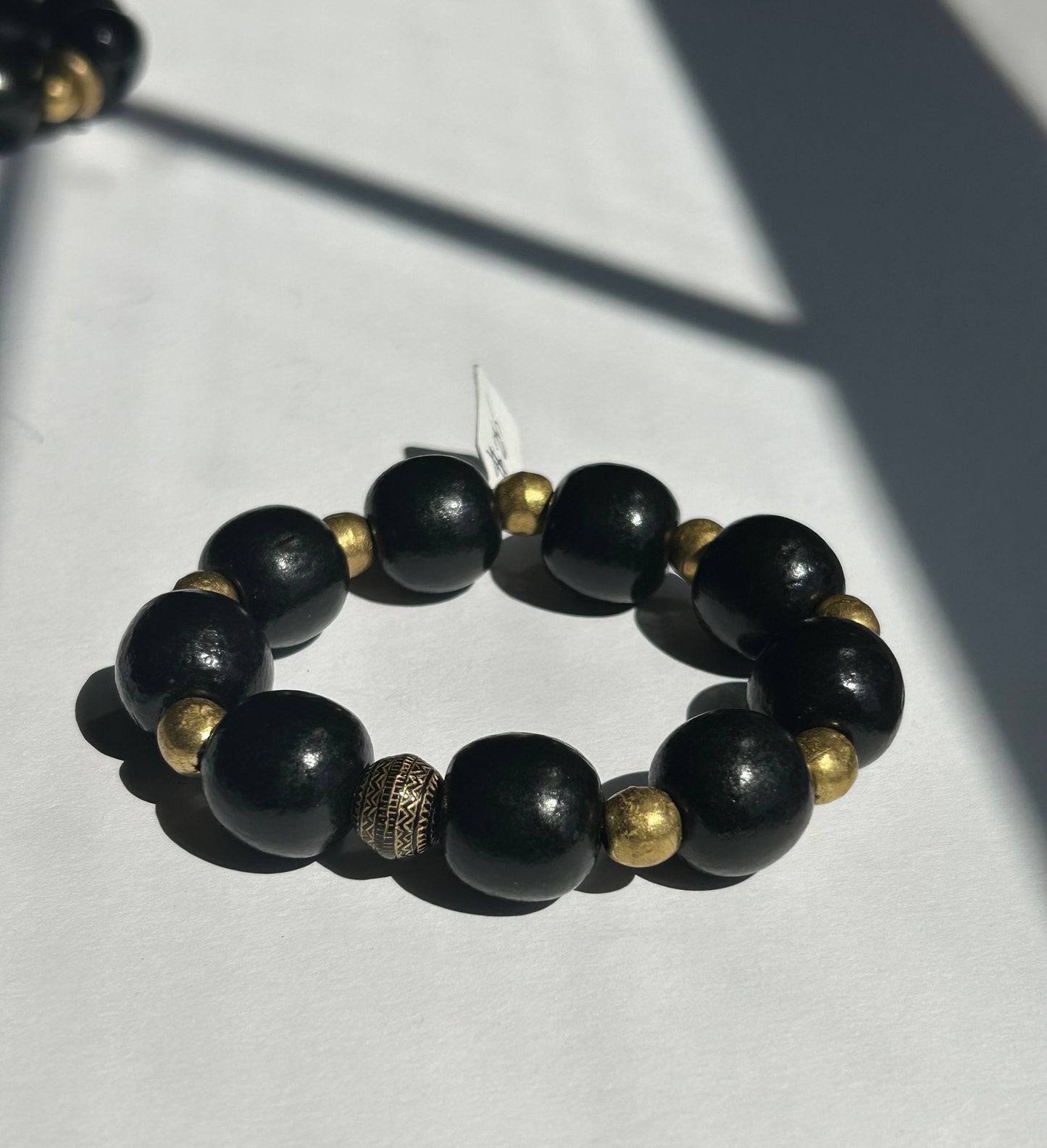 Black Wood Beaded Bracelet with Gold Accents