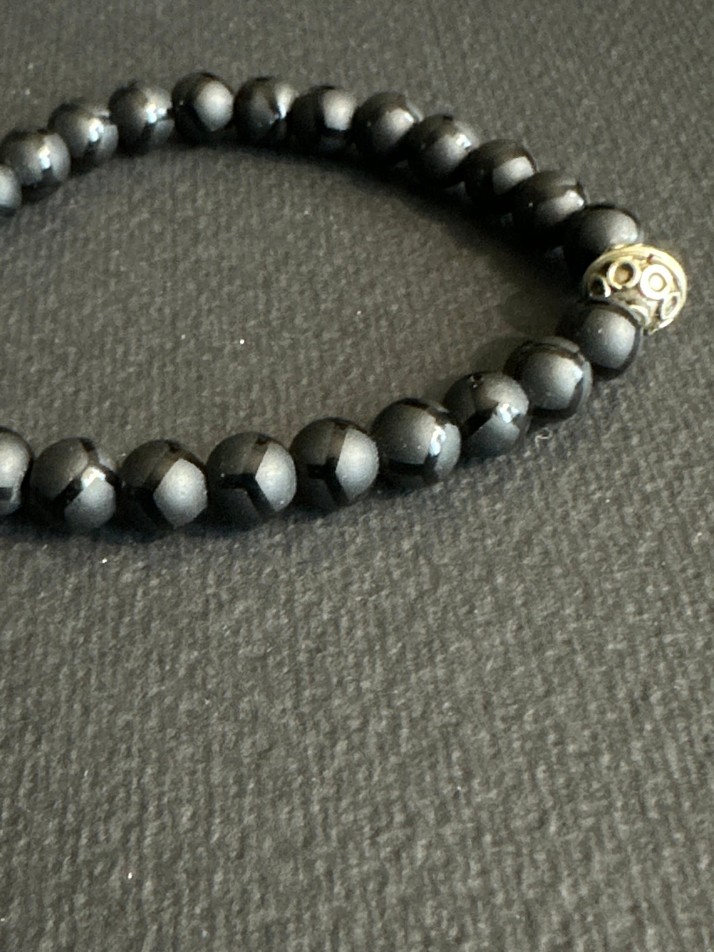 Striped Matte Onyx Bracelet with and Silver Focal Bead