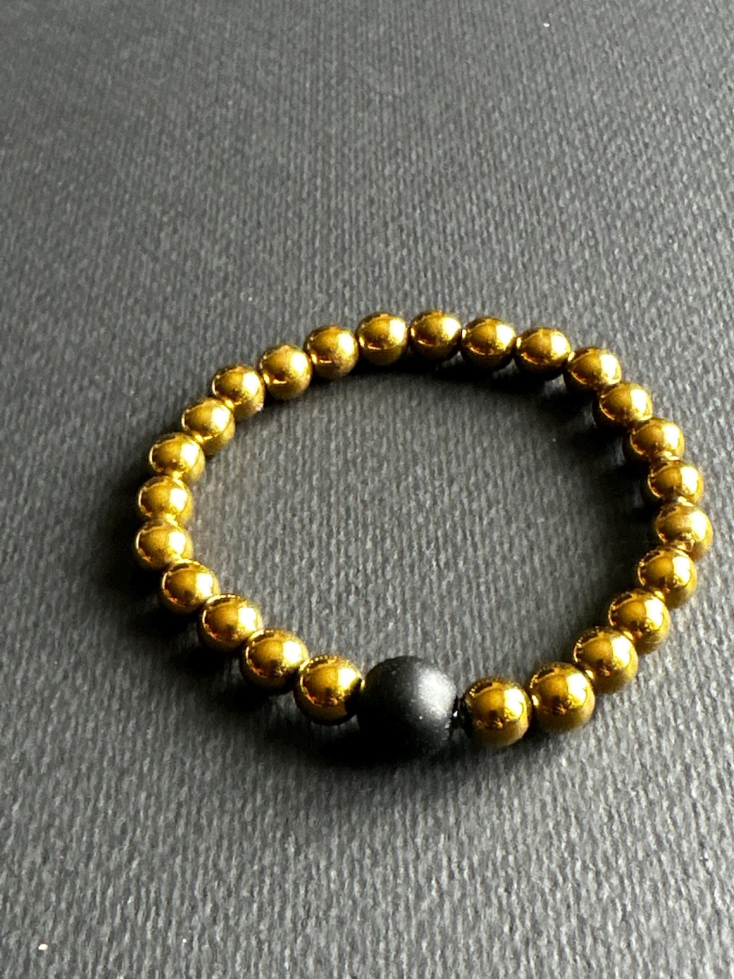 Hematite Stackable Unisex Bracelet with Black Single Focal Bead