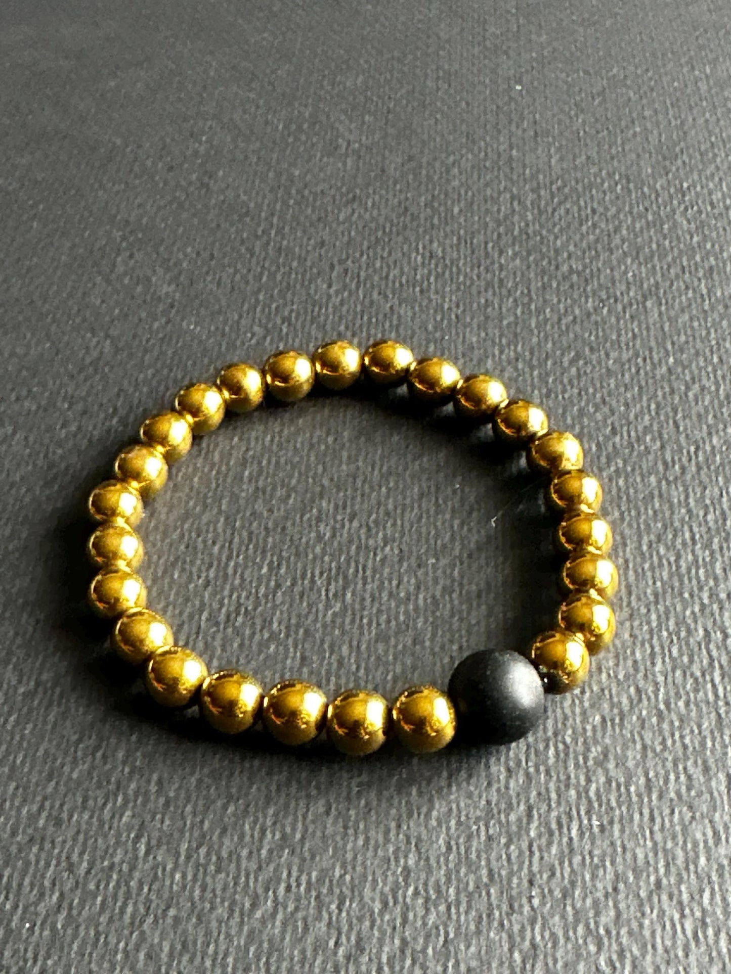 Hematite Stackable Unisex Bracelet with Black Single Focal Bead
