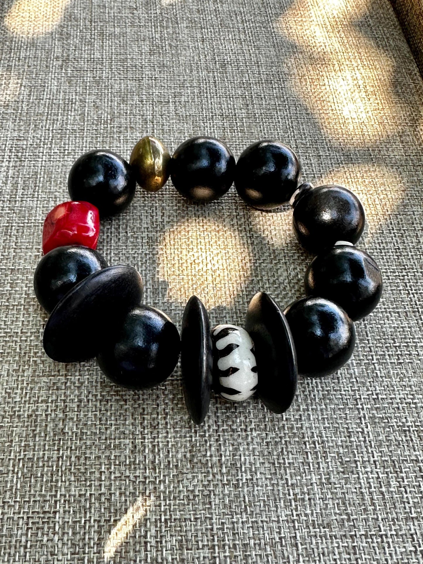 Handmade Black Wood Bead Bracelet: Red Coral & Kenyan Bone Statement