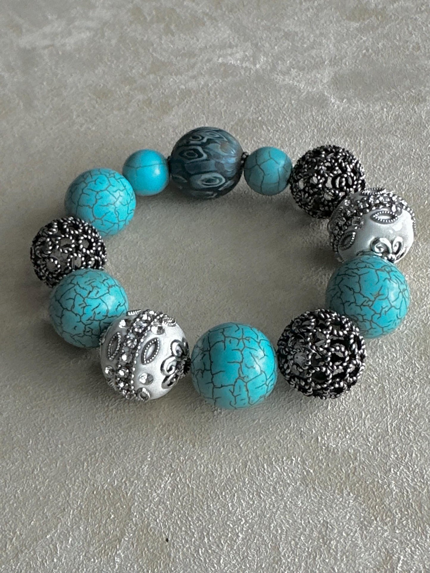 Turquoise Howlite Beaded Bracelet with Embellished White and Silver Metal Beads