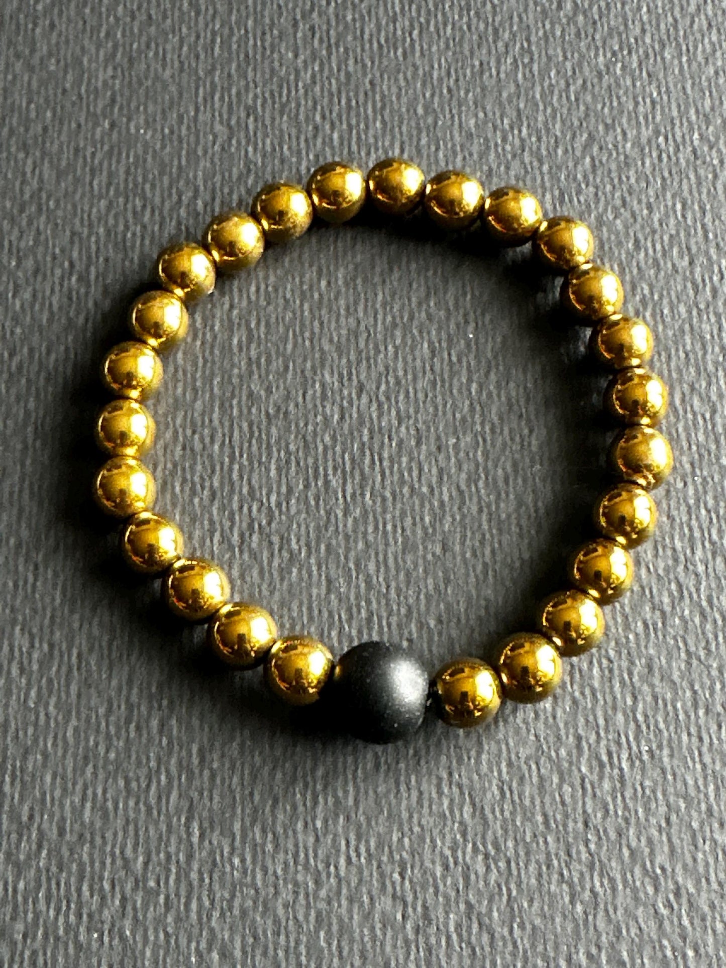 Hematite Stackable Unisex Bracelet with Black Single Focal Bead