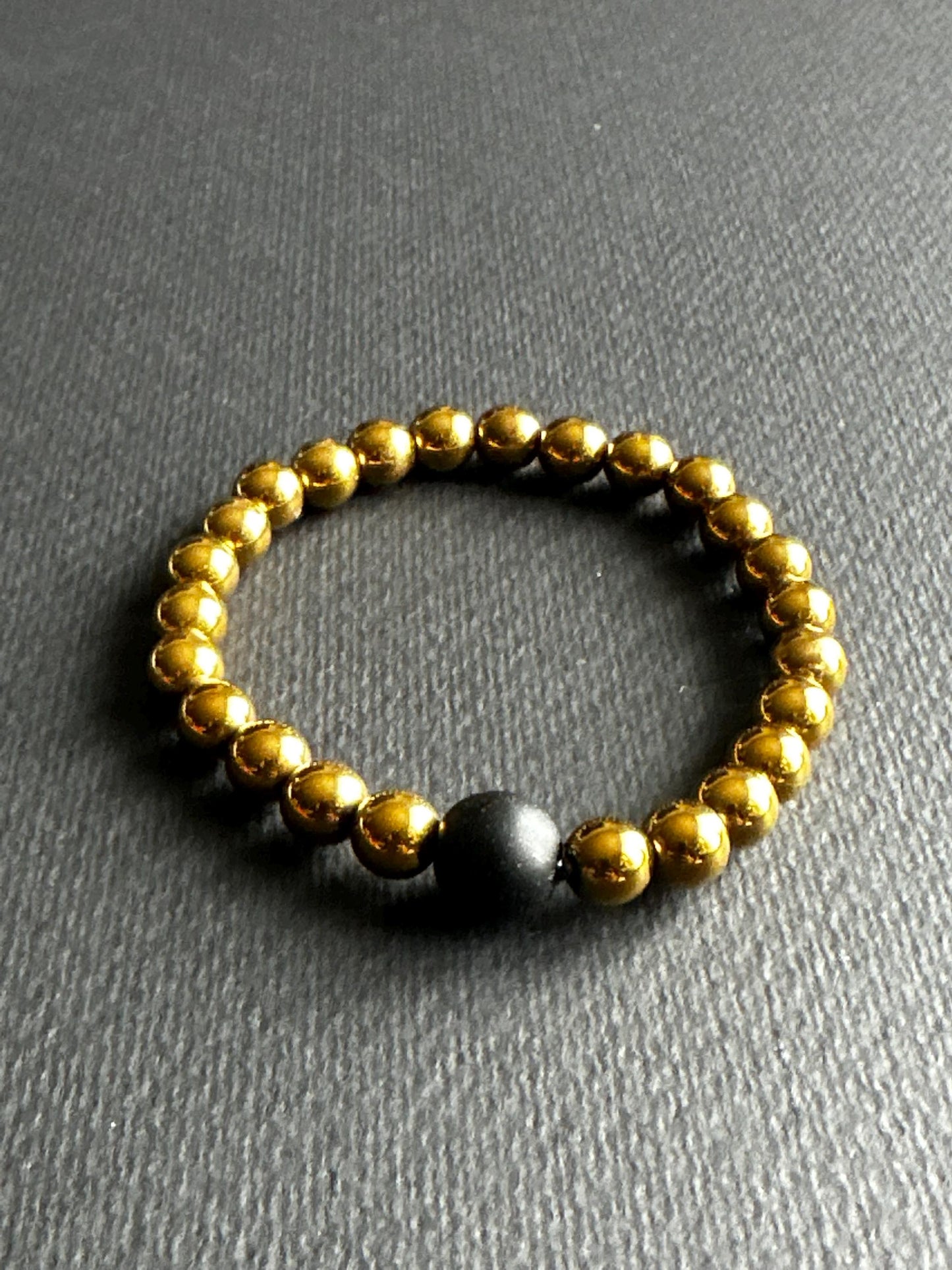Hematite Stackable Unisex Bracelet with Black Single Focal Bead