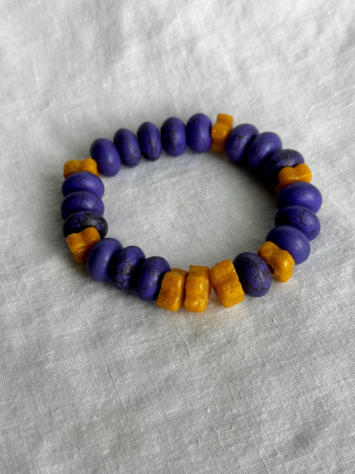 Purple and Gold Unisex Ceramic and Krobo Beaded Stackable Bracelets